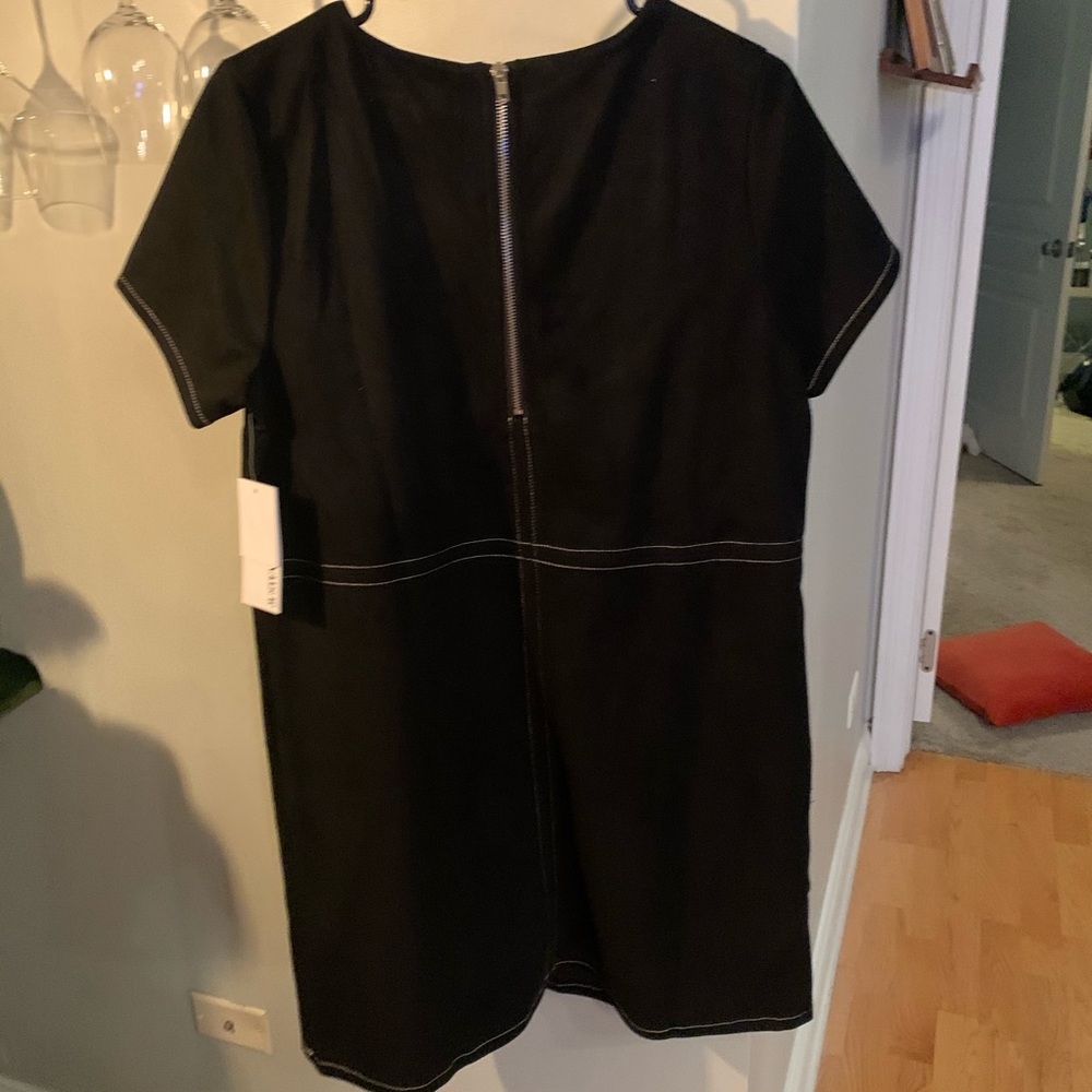 Black dress with white stitching